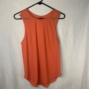lululemon tank top/ muscle shirt size is about a 6 color cute melon orange color